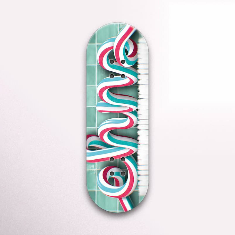 Handmade fingerboard deck with funny toothpaste graphic.