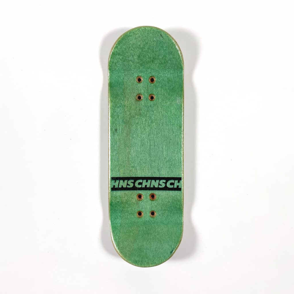 Handmade fingerboard deck with funny toothpaste graphic.